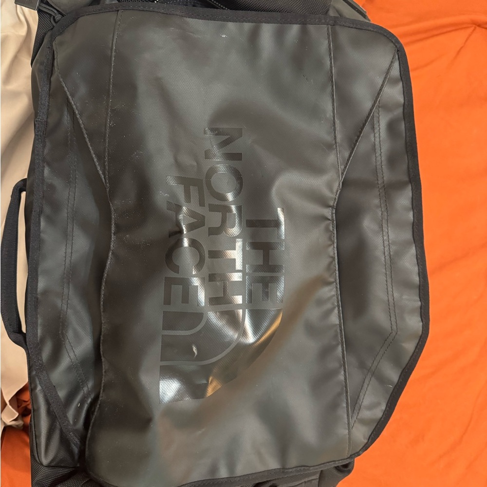 The North Face Black Messenger Bag with Water-Resistant Finish